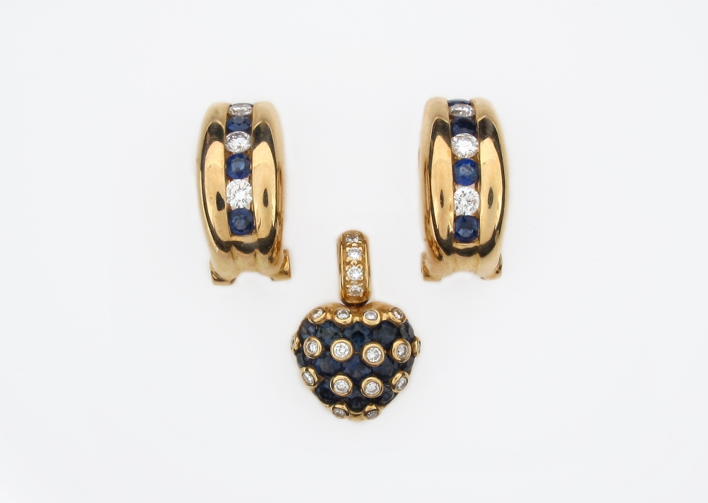 A pair of sapphire and diamond set gold earrings, each earring is alternately set with four circular