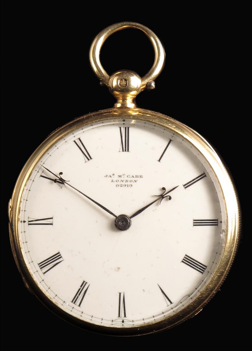 McCabe. An 18ct gold lever watch, white enamel dial and three quarter plate movement signed Jas.