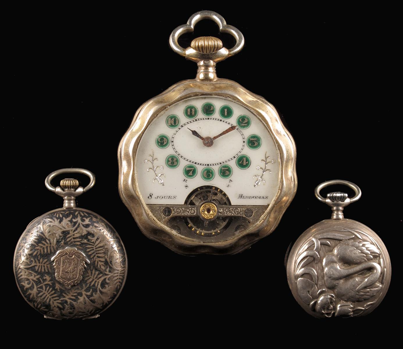 A silver gilt 8 day Hebdomas watch, with green chapters and visible lever escapement, in faceted