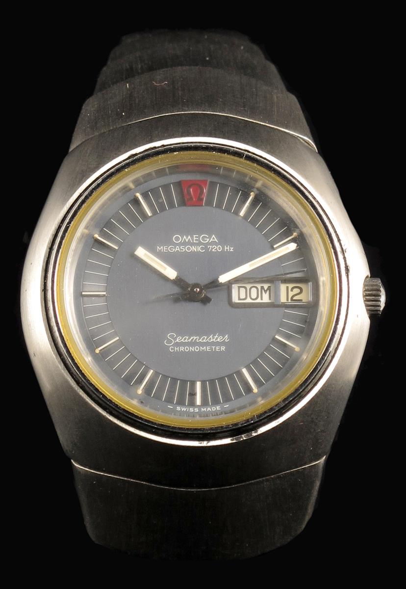 Omega: A seamaster megasonic 720 Hz wristwatch, day, date in stainless steel case with integral