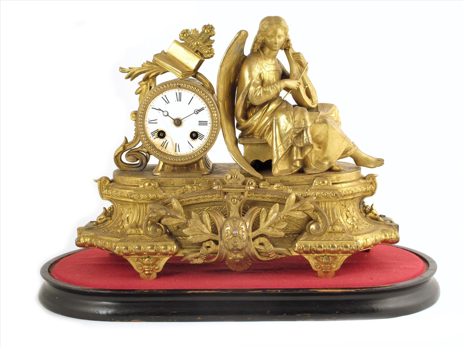 A French gilt spelter mantel clock, striking movement with white enamel dial (cracked), in a drum