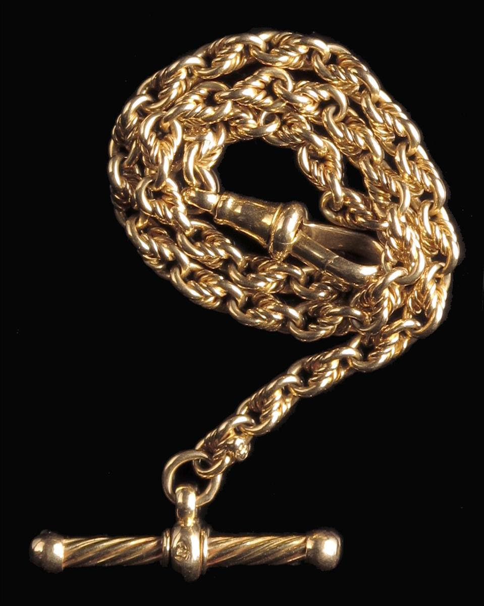 An 18ct gold watch chain, of rope twist design, with T bar and dog clip, 9in (23cm) long.