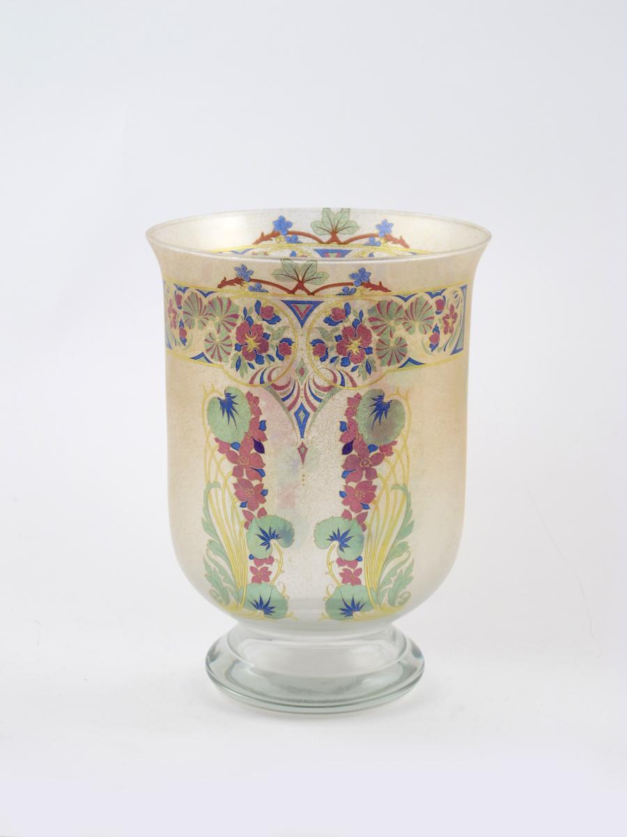 An enamelled glass vase, probably Austrian, flaring, bucket form, enamelled with flower sprays in