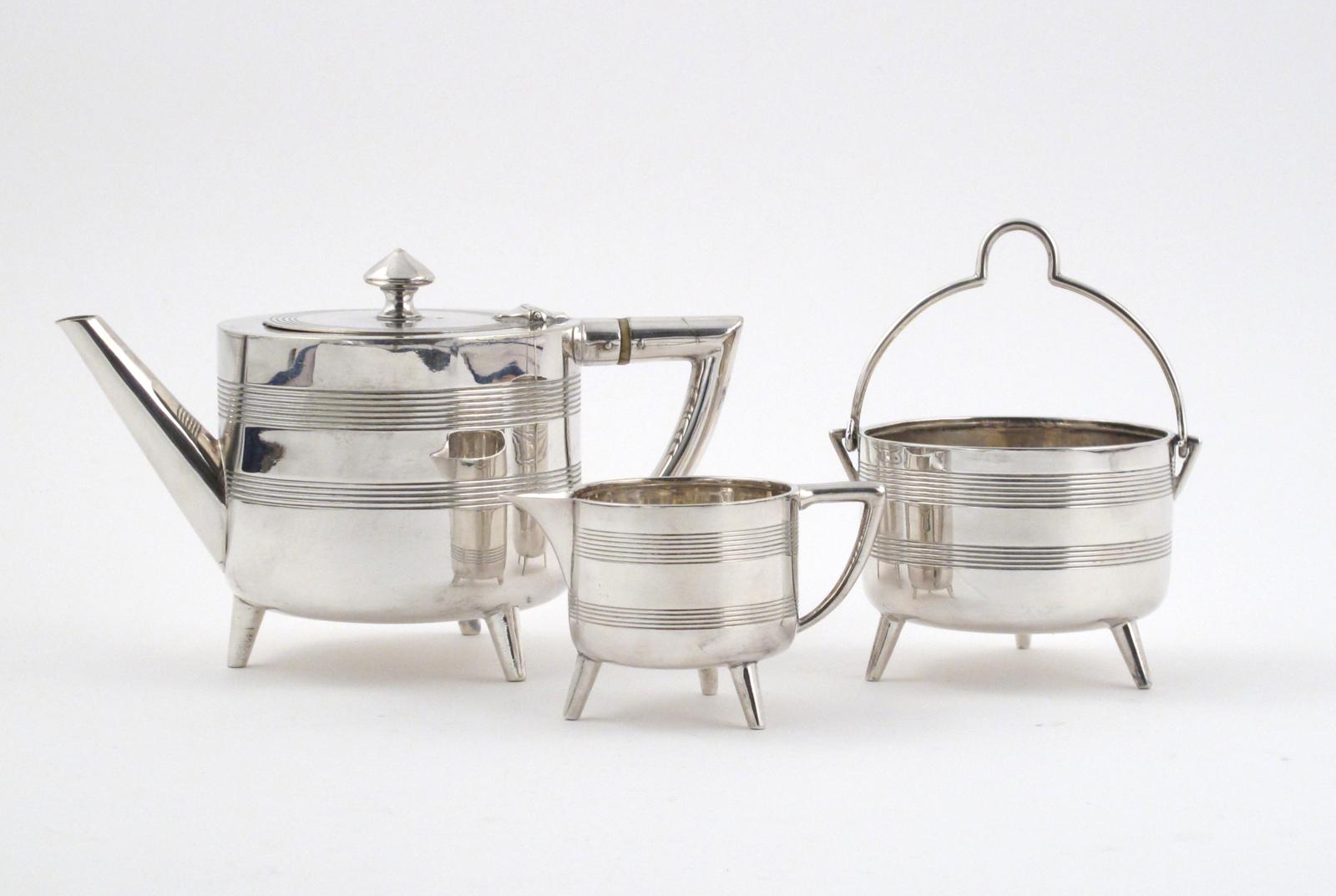 A Mappin & Webb electroplated three piece tea set, in the manner of Dr Christopher Dresser, model