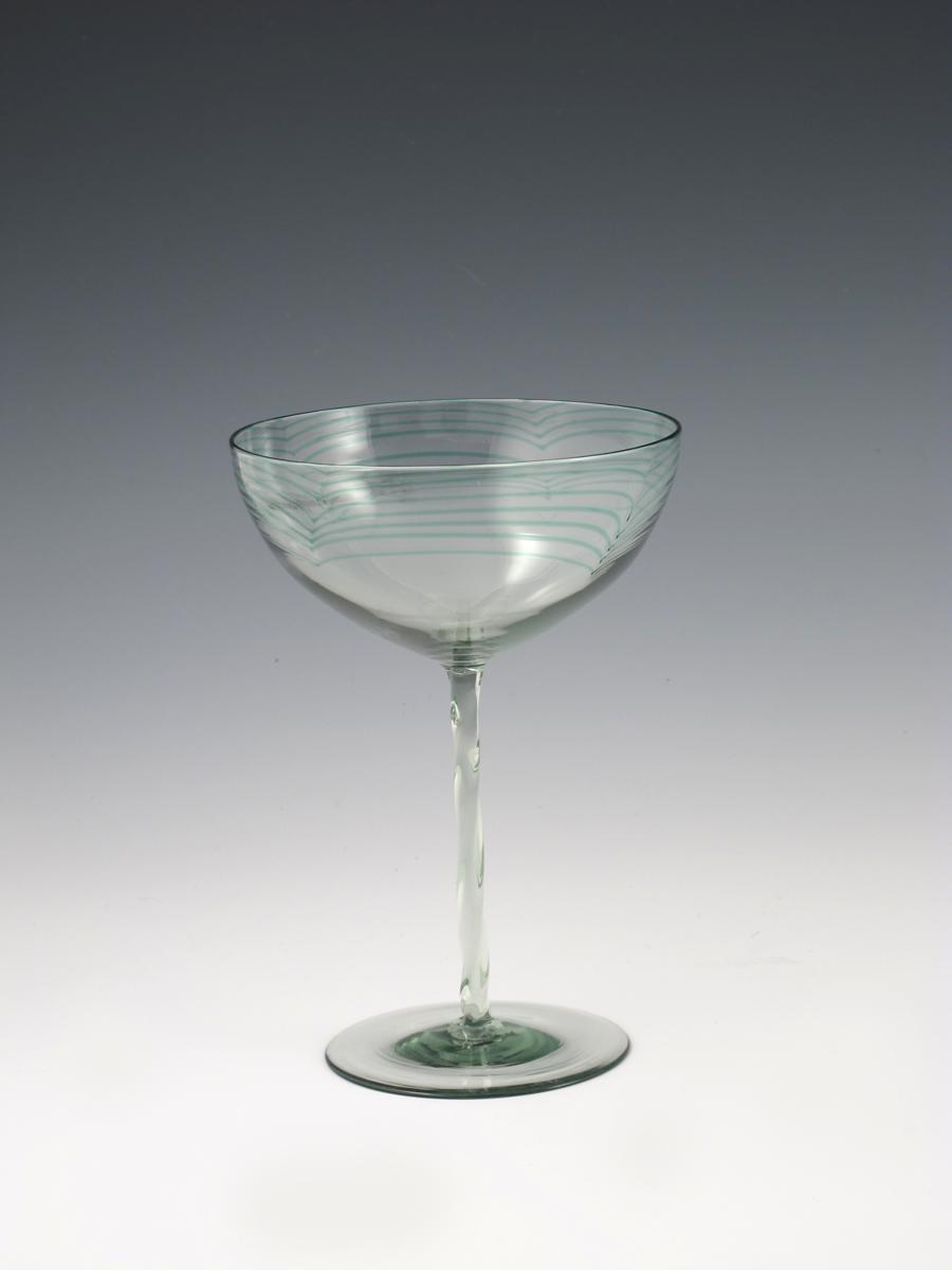 A rare James Powell & Sons, Whitefriars Minerbi glass goblet, the wide bowl with green pulled down