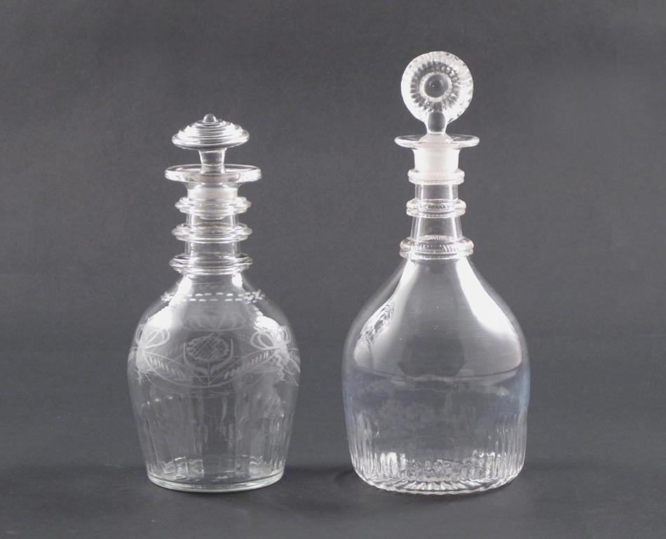 Two Irish glass decanters and stoppers c.1800, the first Waterloo Co. engraved with ribboned