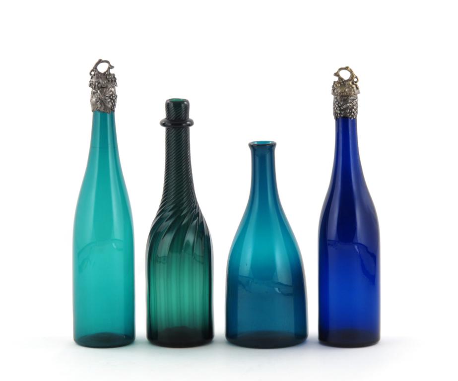A pair of coloured glass bottles with metal mounts and stoppers 19th century, one blue and one