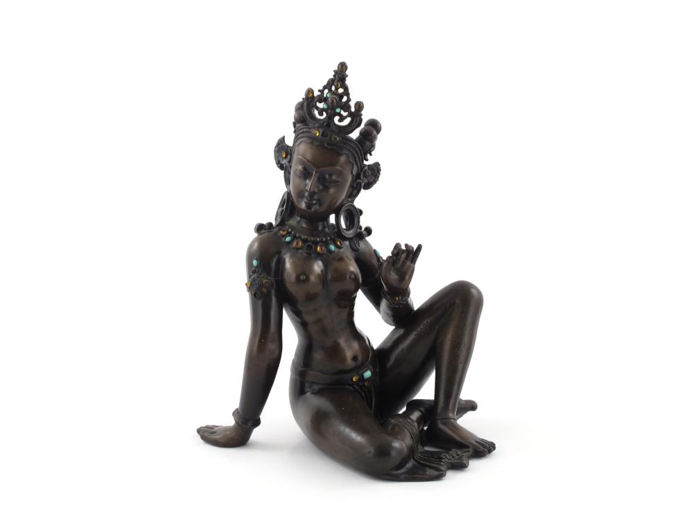 A bronze statue of Uma modern, the Tibetan goddess seated and wearing a jewelled headdress, necklace