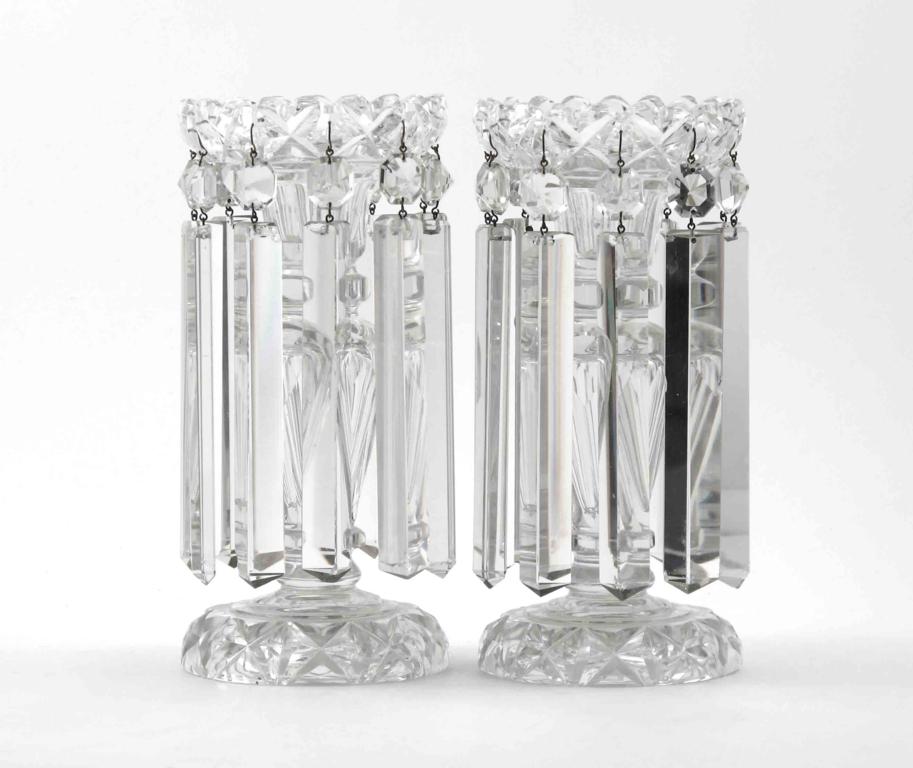 A good pair of glass table lustres 19th century, the faceted stems rising from circular cross-cut