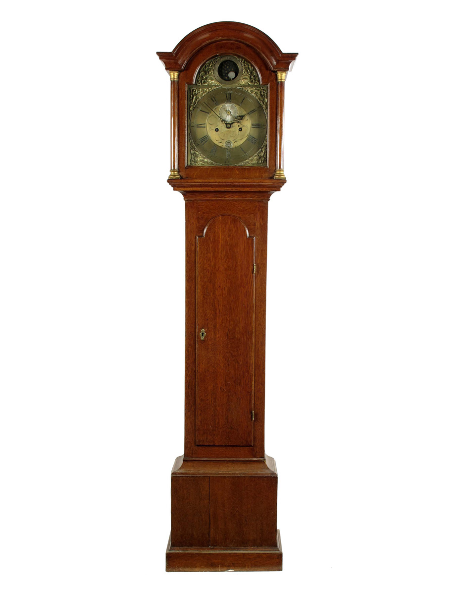 An 8 day oak longcase clock with automaton, the 12 inch brass dial signed Will Henell, Alresford, in