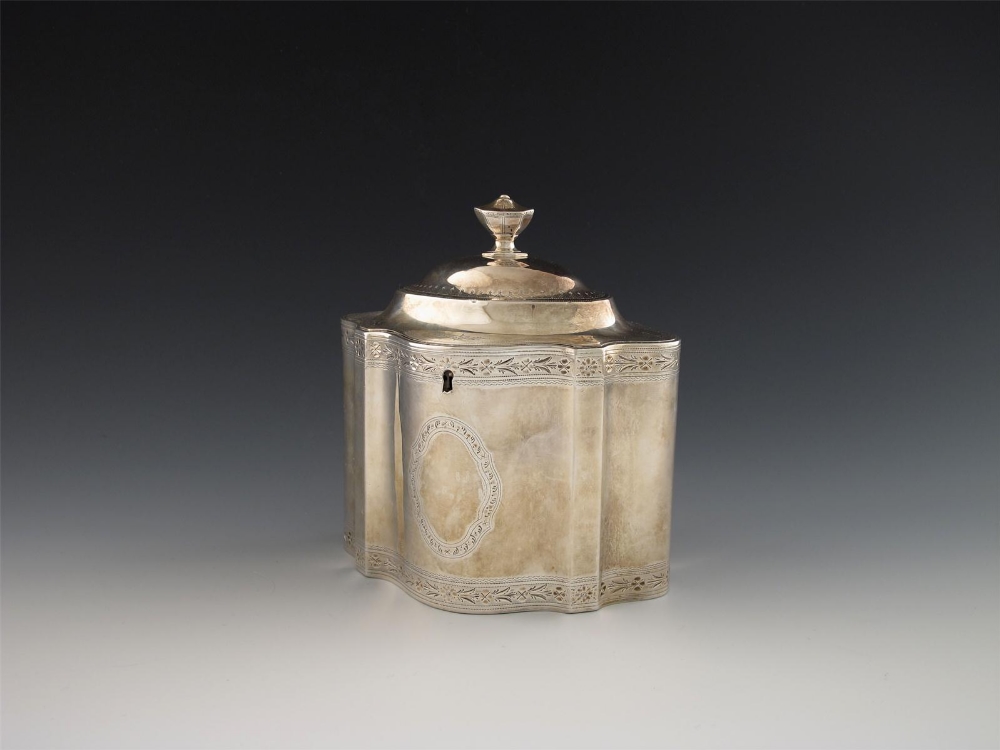 A George III silver tea caddy, maker`s mark of Peter and Ann Bateman, over-struck with maker`s mark