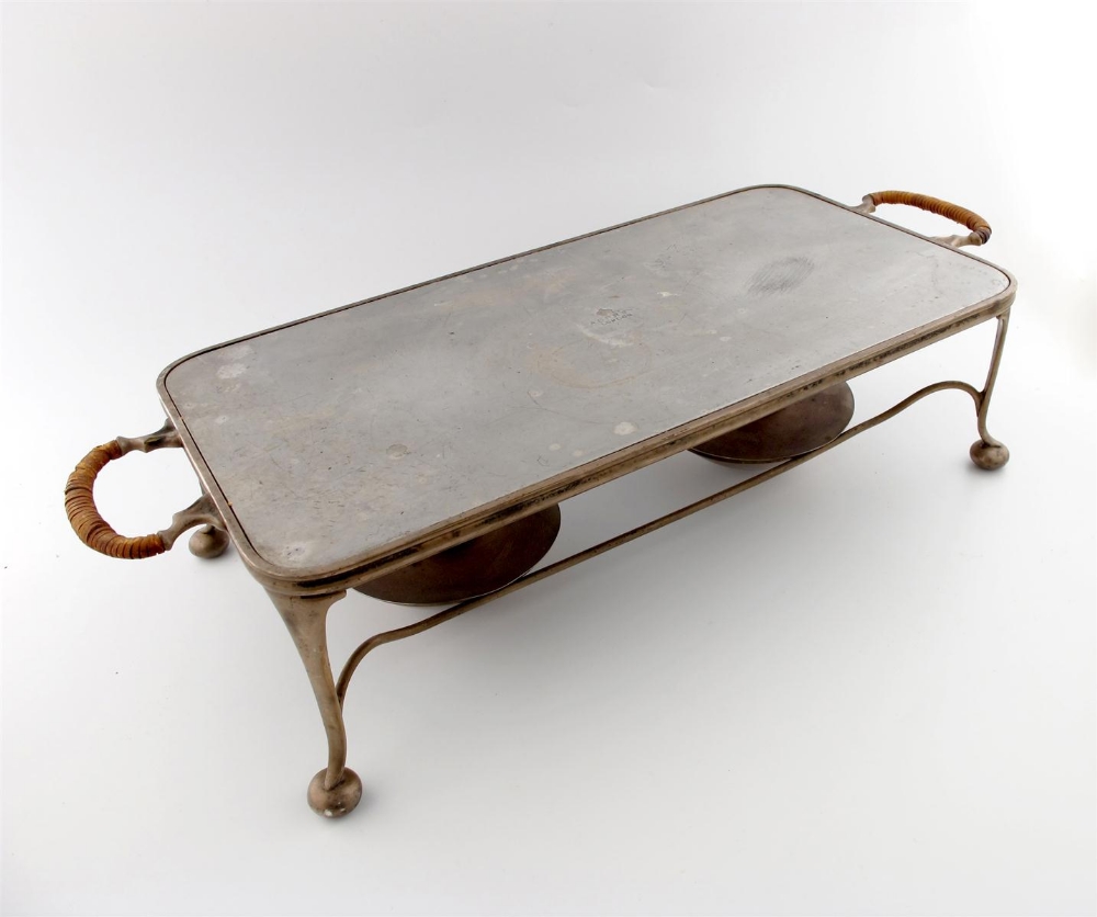 An electroplated warming stand, by Asprey, London, rounded rectangular form, wire-work frame,