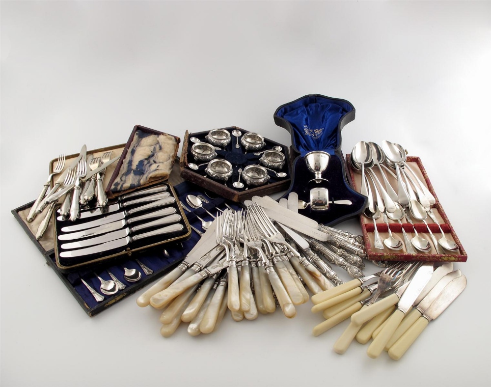 A mixed lot, comprising silver items: a set of twelve dessert spoons, by James Dixon and Sons,