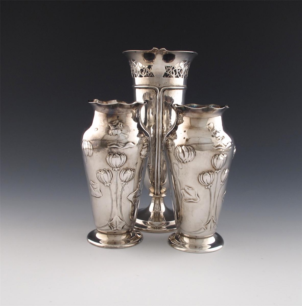 A pair of Edwardian silver Art Nouveau vases, by Mappin and Webb, London 1903, tapering circular