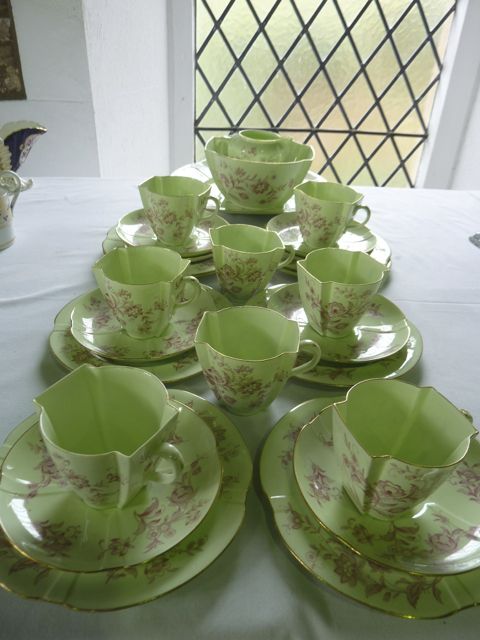 A collection of Victorian tea wares of unusual quatrefoil type form with pink printed floral