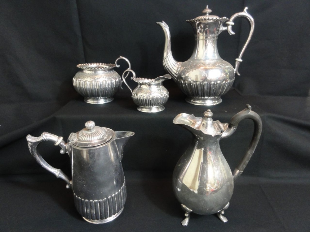 A 19th century electro plated four piece coffee set with half fluted and chased decoration and an