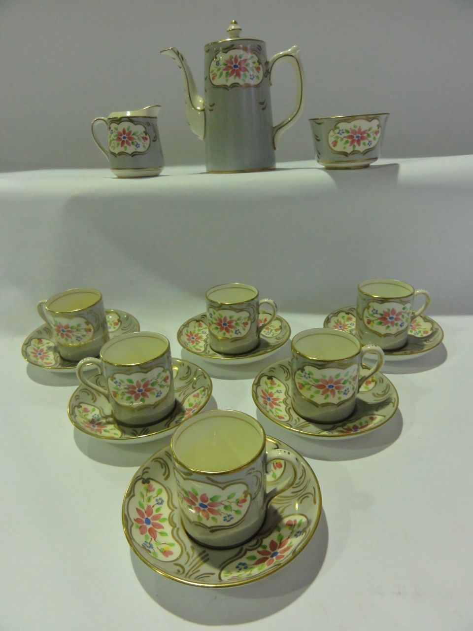 A six place Georgian style coffee set marked Salisbury Crown China including coffee pot, milk jug,