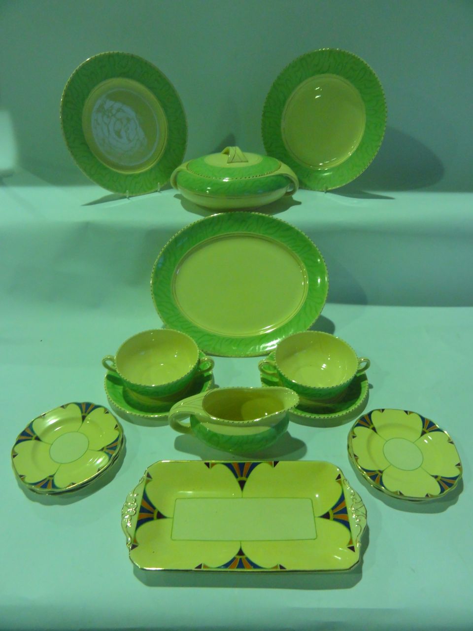 A quantity of Art Deco style Burleigh ware dinner wares comprising two lidded tureens, a platter,