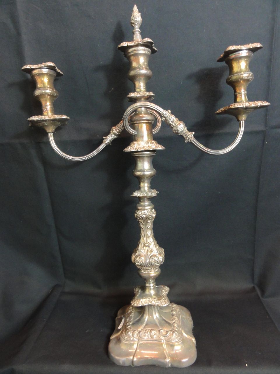 A large 19th century silver plated three branch candelabrum in the Georgian style with acanthus leaf