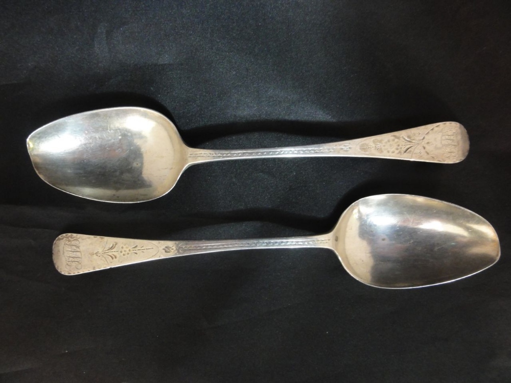 A pair of Georgian silver tablespoons with bright cut engraved decoration, 3oz approx