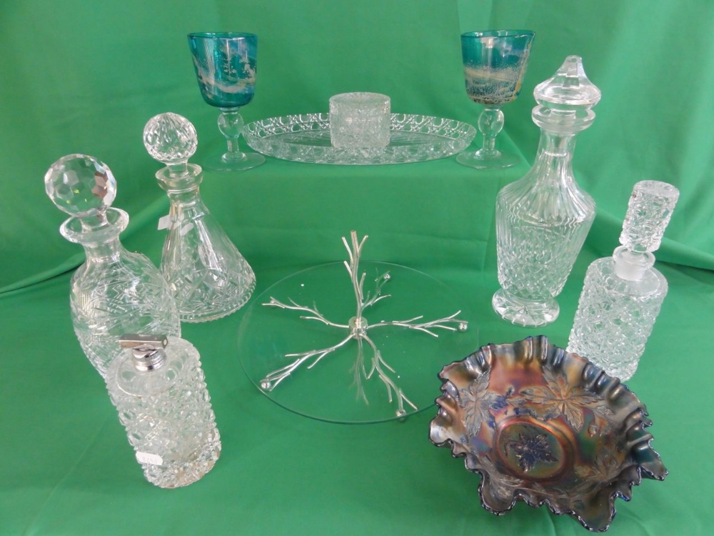 A quantity of cut crystal glass to include a Waterford Crystal decanter of rounded form with a