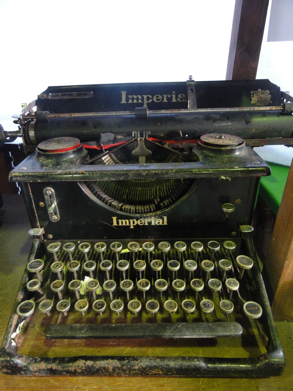 The Oliver Number 5 typewriter, an Imperial 58 typewriter, a further Imperial model and a Smith