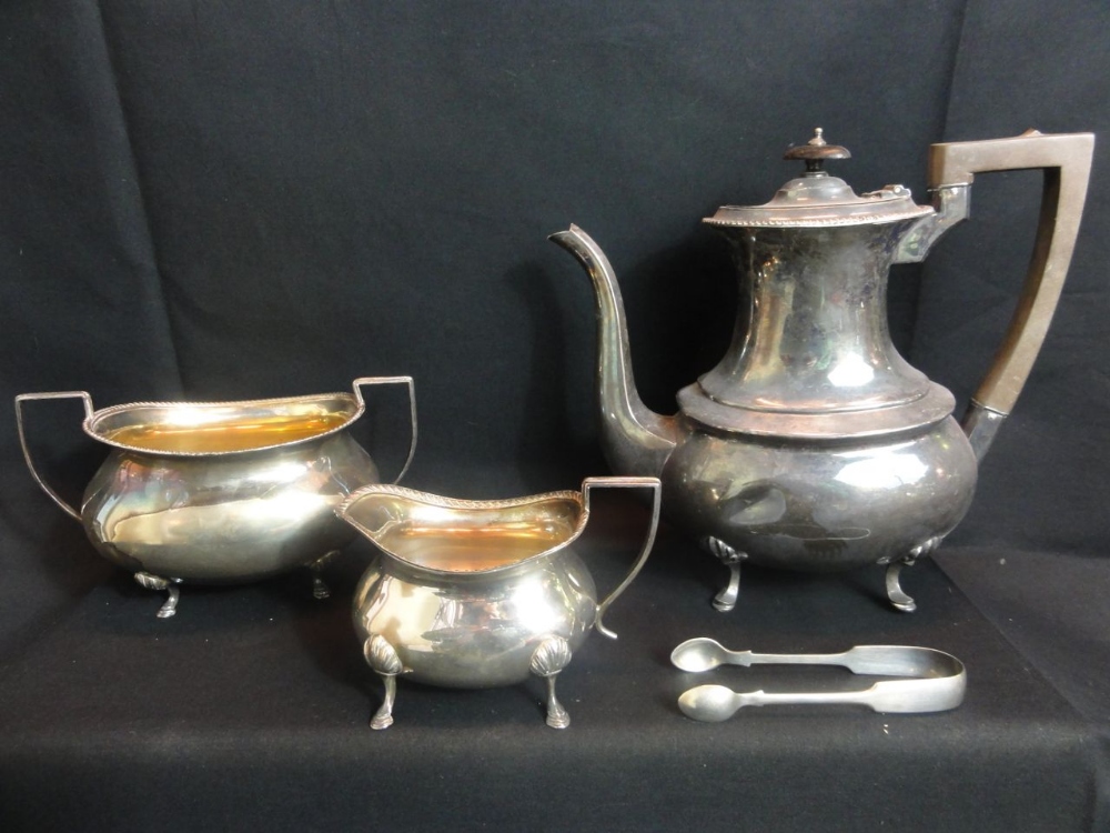 A 19th century three piece EPNS coffee set in the Georgian style with gadrooned border, paw feet