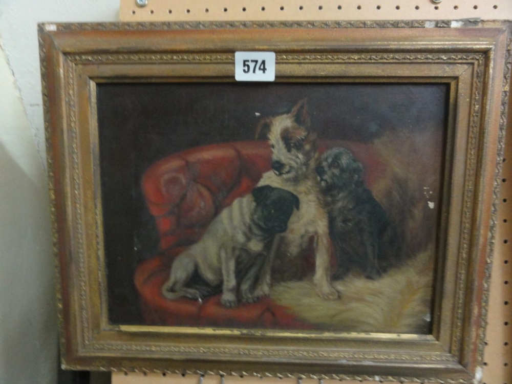 A late 19th century oil painting on canvas of a pug dog and two  other terrier type dogs seated on a