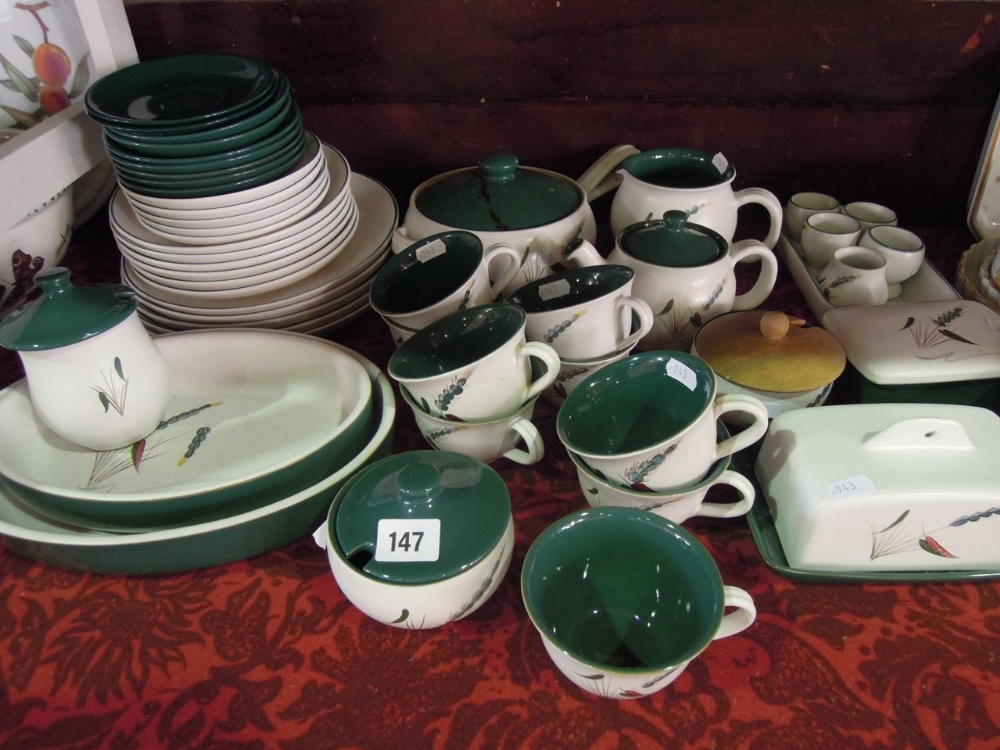 An extensive collection of Denby "Greenwheat" dinner wares comprising seventeen plates (various