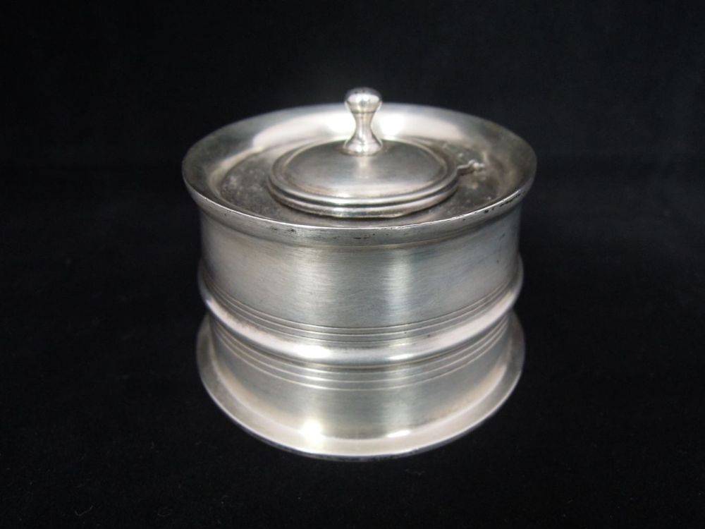 A silver and glass inkwell, hallmarked John Grinsell & Sons, Birmingham 1903