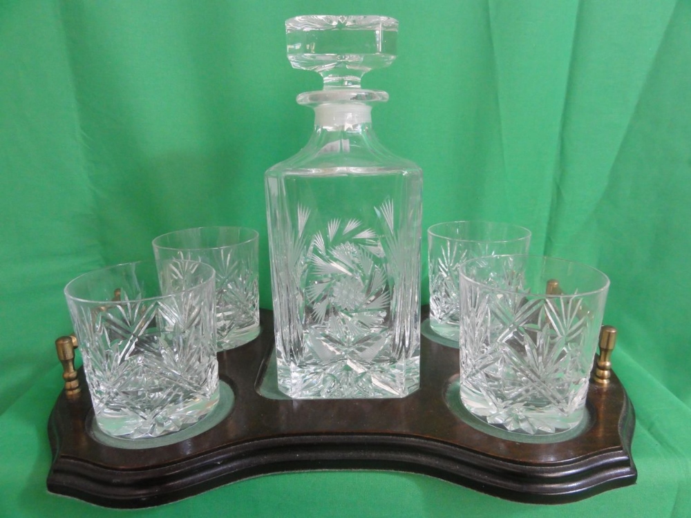 A square cut glass decanter together with four tumbler glasses by Edinburgh Crystal with