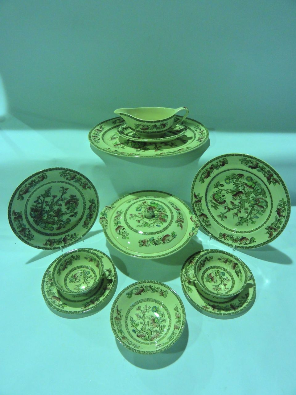 A selection of Johnson Brothers "Indian Tree" dinner wares comprising two lidded tureens, a platter,