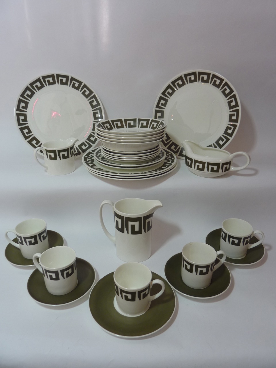 A selection of Wedgwood Susie Cooper design green "Keystone" tea wares including five cups and