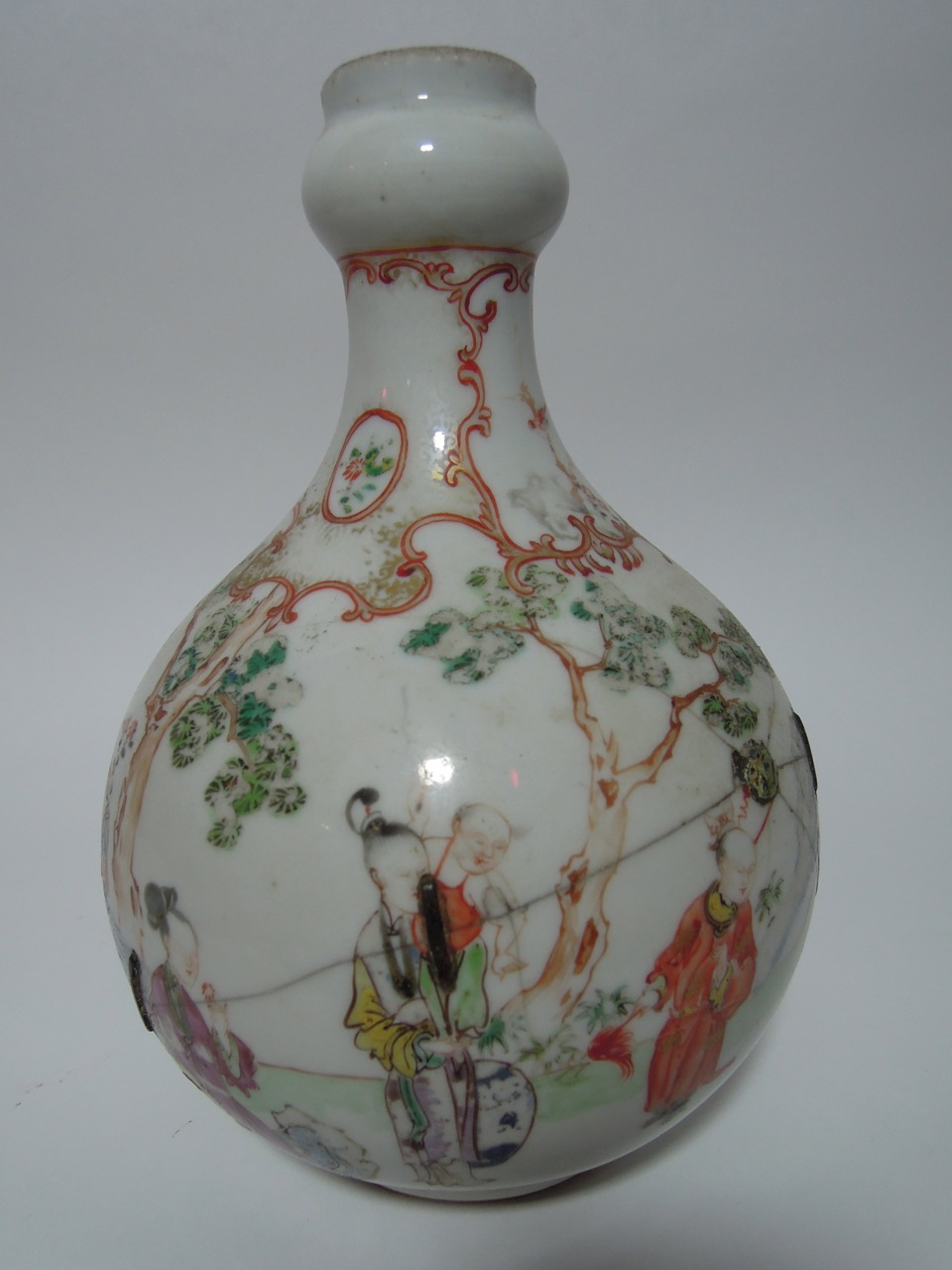 A 19th century Chinese export Famille Rose garlic neck bottle vase decorated with woman and children