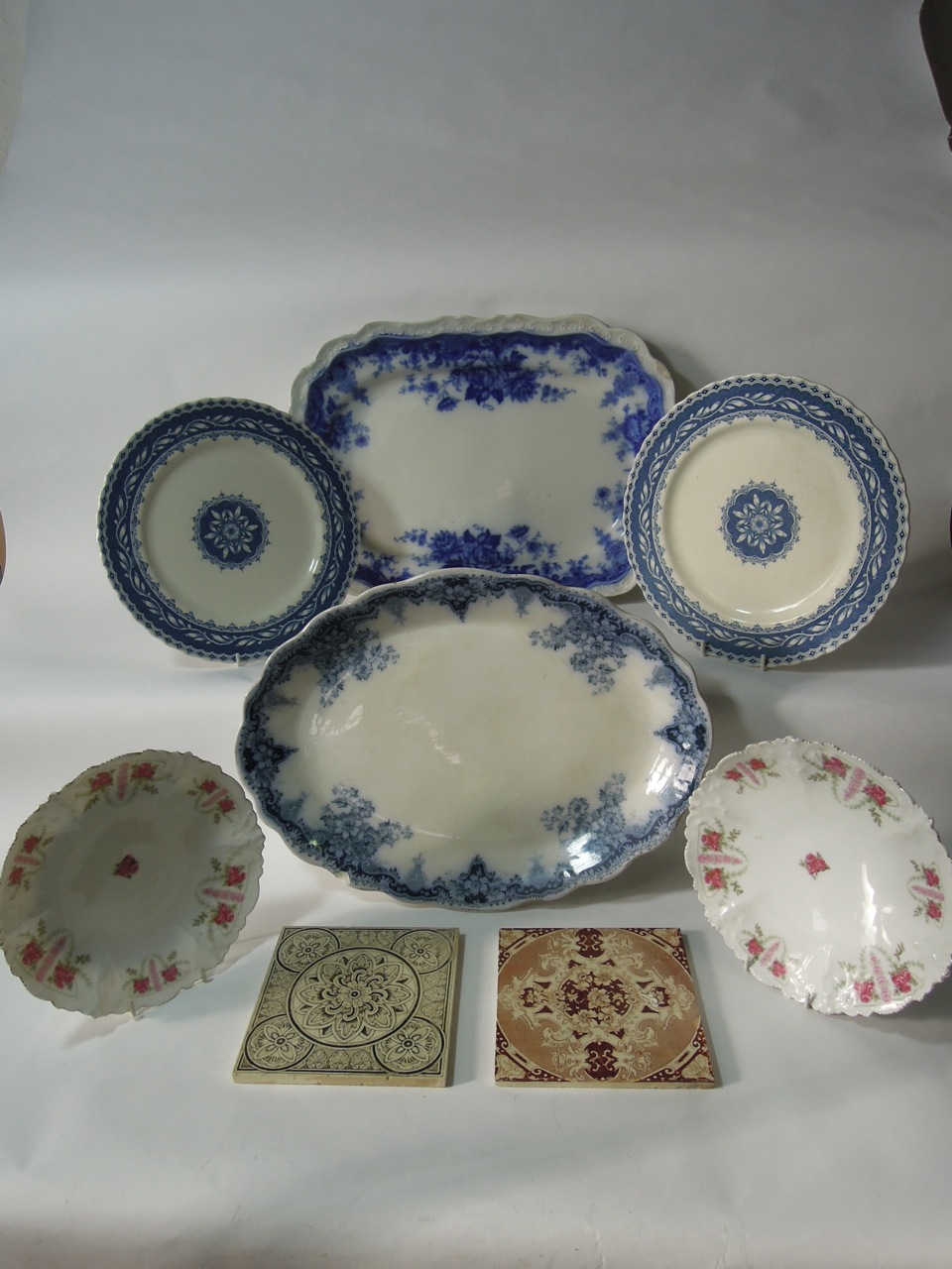 A 19th century oval blue and white serving platter, a Wedgwood "Corea" blue and white meat plate,