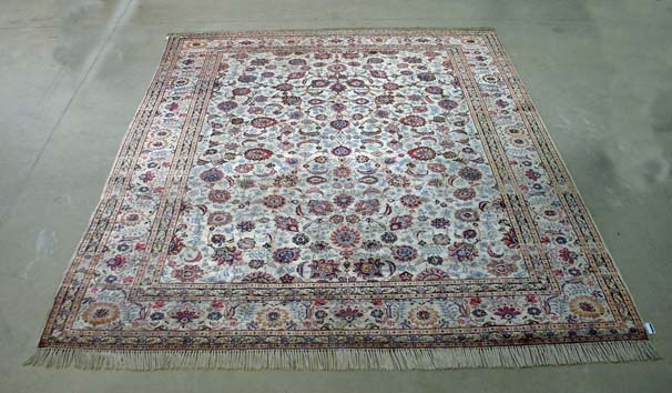 A KESHAN SILK CARPET, PERSIA, CIRCA 1950 condition: fair, some areas of minor wear, refringed  372