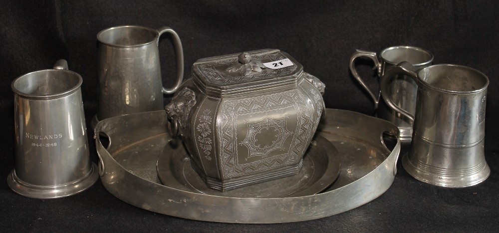 Victorian pewter tea caddy with lion mark and ring handles, four pewter tankards, pewter dish and an