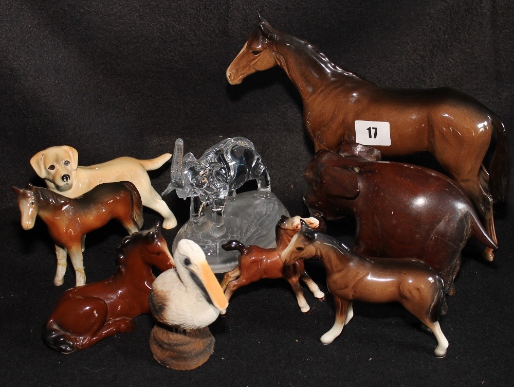 Beswick model of a horse, four other horse models, treen elephant and crystal model of an elephant