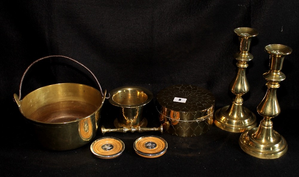 Pair of brass candlesticks, small jelly pan, brass mortar and pestle and other brassware.