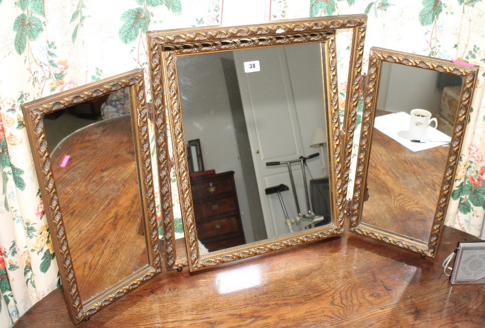Giltwood triple dressing table mirror.