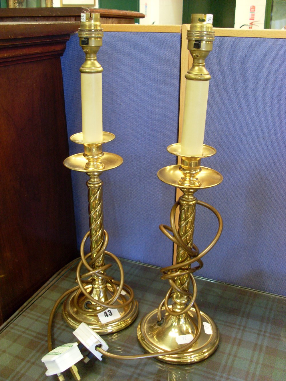 Two brass table lamps.