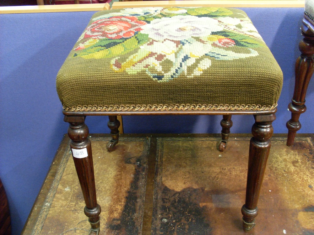 Victorian square top stool on turned supports.