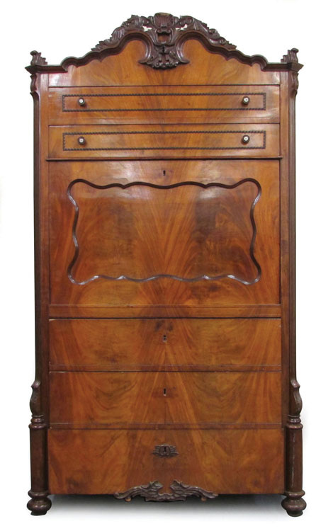 A 19th century Continental mahogany secretaire a abattant with fall front, fitted interior and an