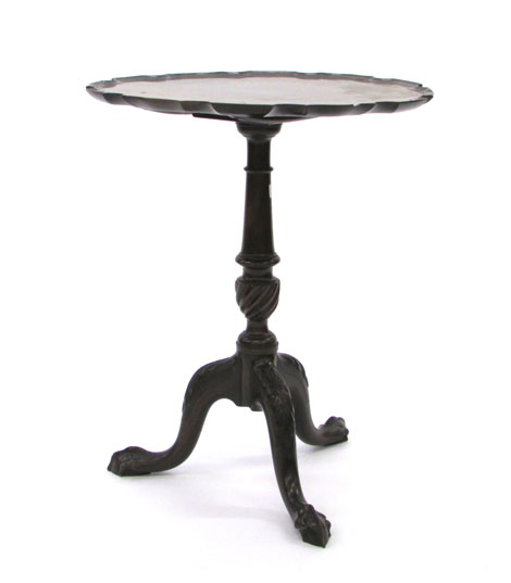A Chippendale-style mahogany tripod table on ball and claw supports, d. 52 cm  CONDITION REPORT: top