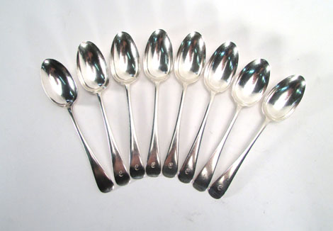 A set of six silver dessert spoons with Old English pattern handles by Mappin & Webb, two similar