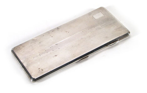 An Art Deco silver engine turned cigarette case, maker JG Ltd., Birmingham 1935, l. 18 cm, 9 ozs