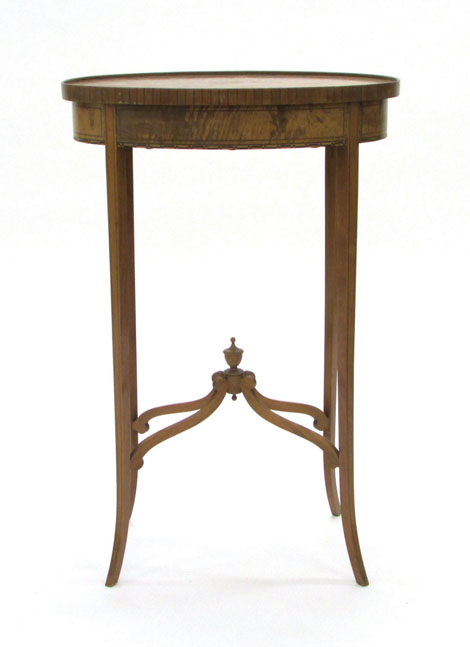 An Edwardian George III-style satinwood and strung occasional table of oval form, w. 48 cm