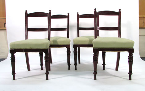 A set of eight Edwardian walnut framed dining chairs with reeded frames on square tapered legs