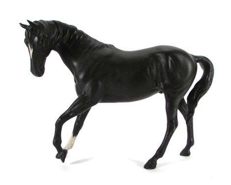 A Beswick model of a standing horse, black, matt, h 17 cm CONDITION REPORT: no chips or cracks, some