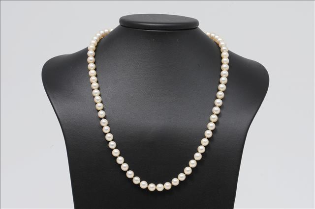 A LONG CULTURED PEARL NECKLACE, comprising of 128 pearls approx 6-6.5mm diameter with a 9ct gold and